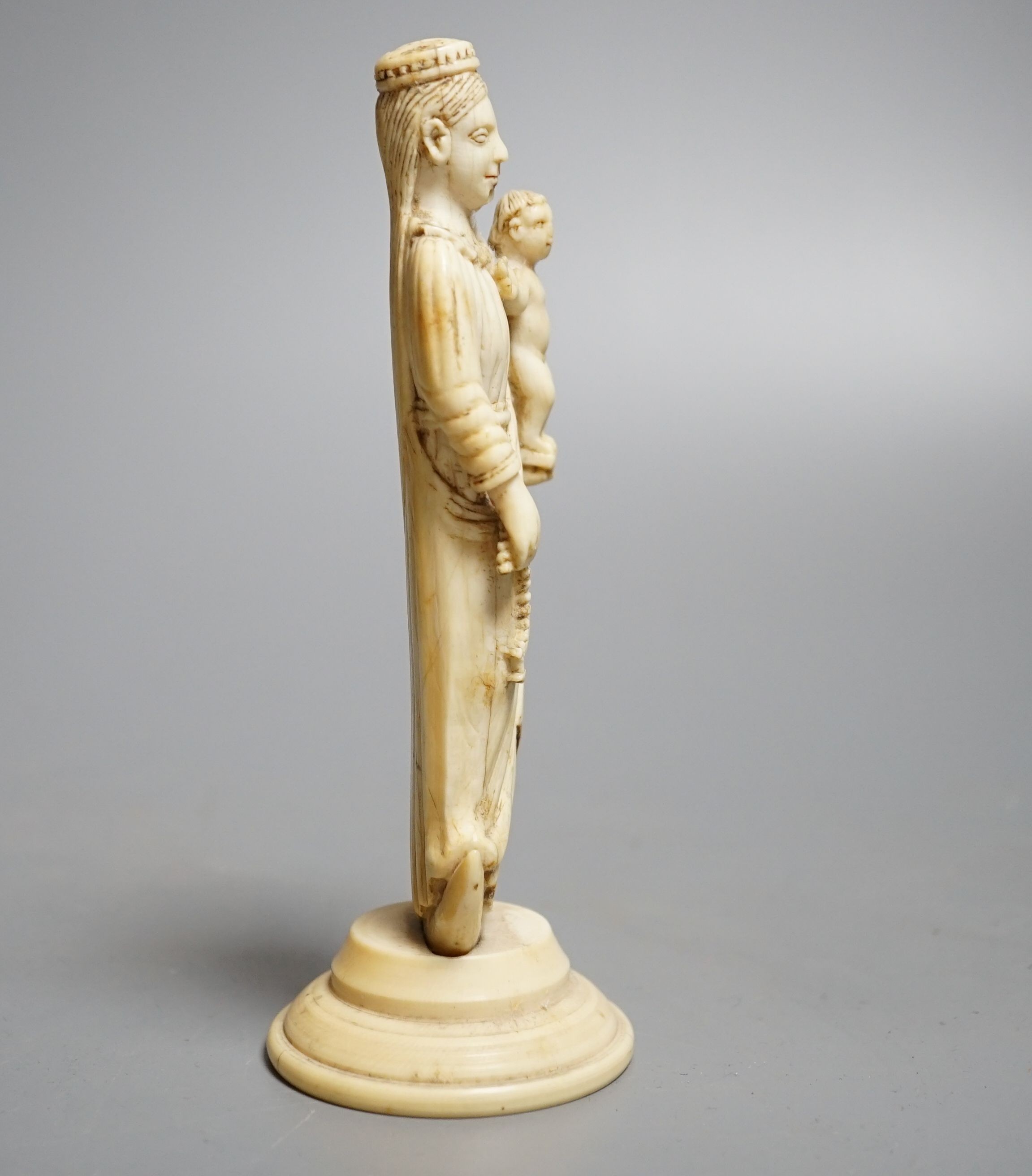 A 19th century Indo-Portuguese carved ivory model of the Virgin and child, height 15cm